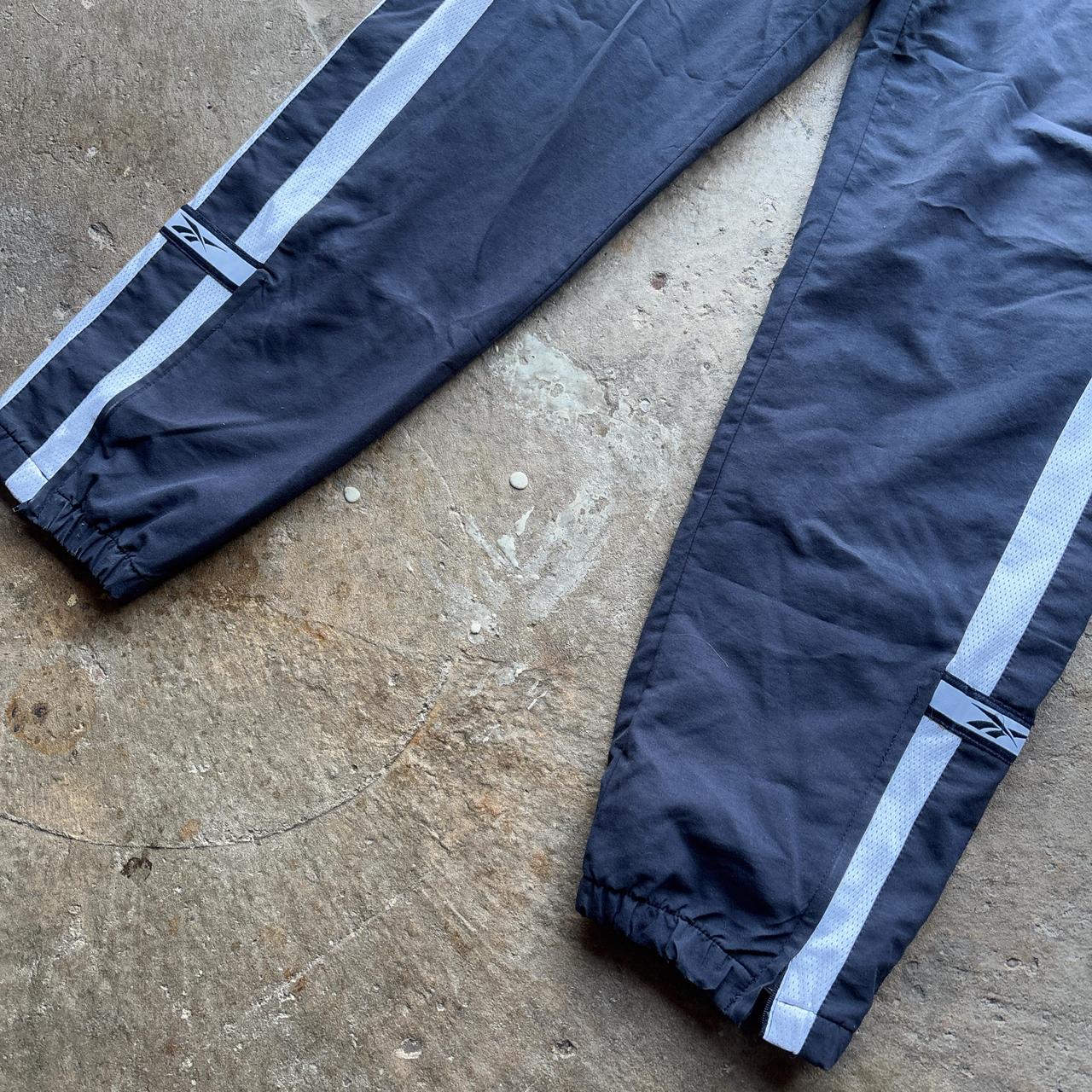 Vintage Navy Reebok tracksuit bottoms with embroidered logo