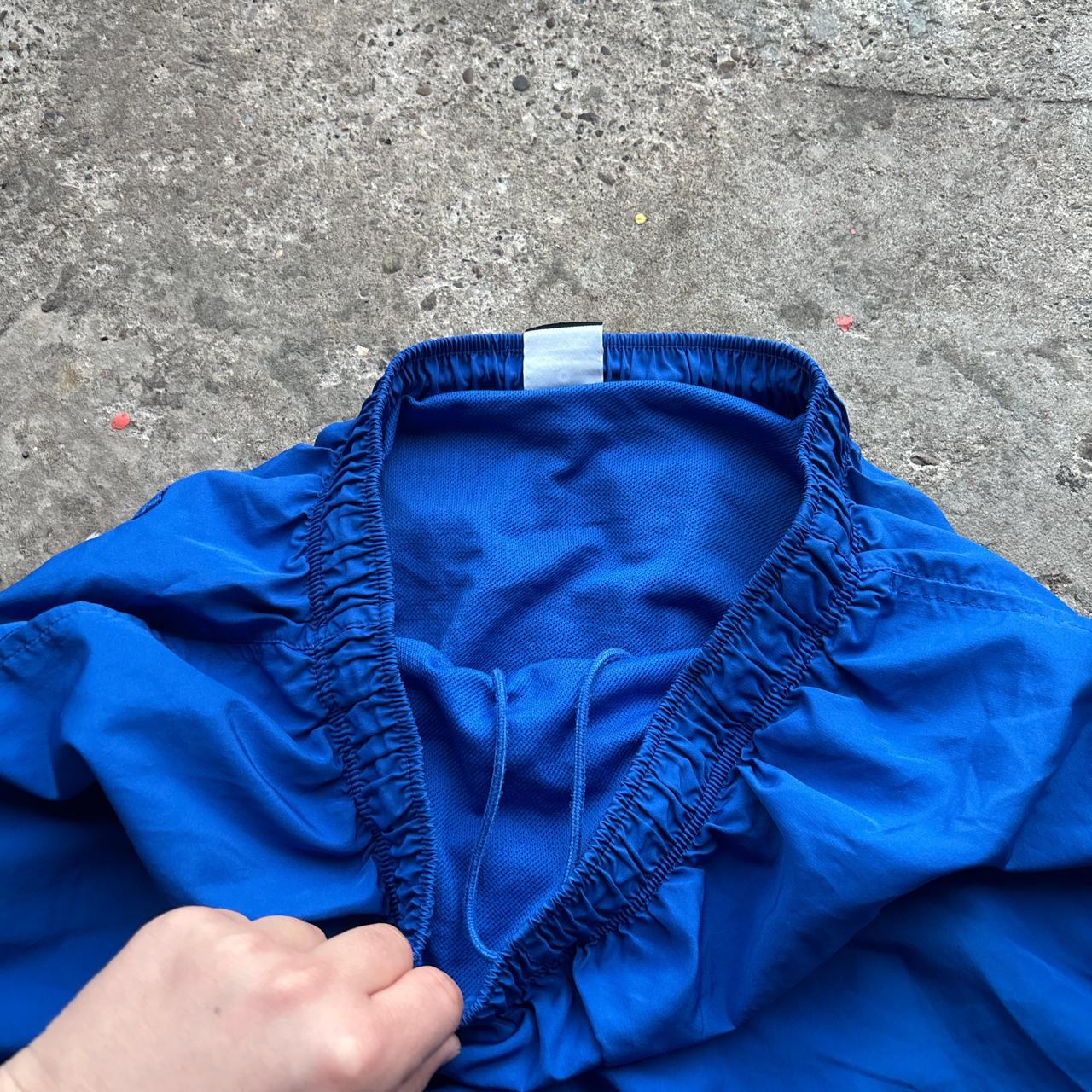 Blue Nike swim shorts / trunks