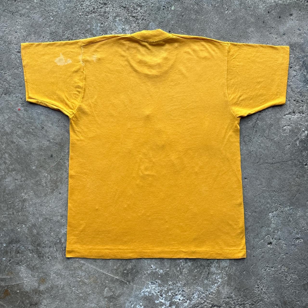 Yellow graphic tee with Viking marching band graphic