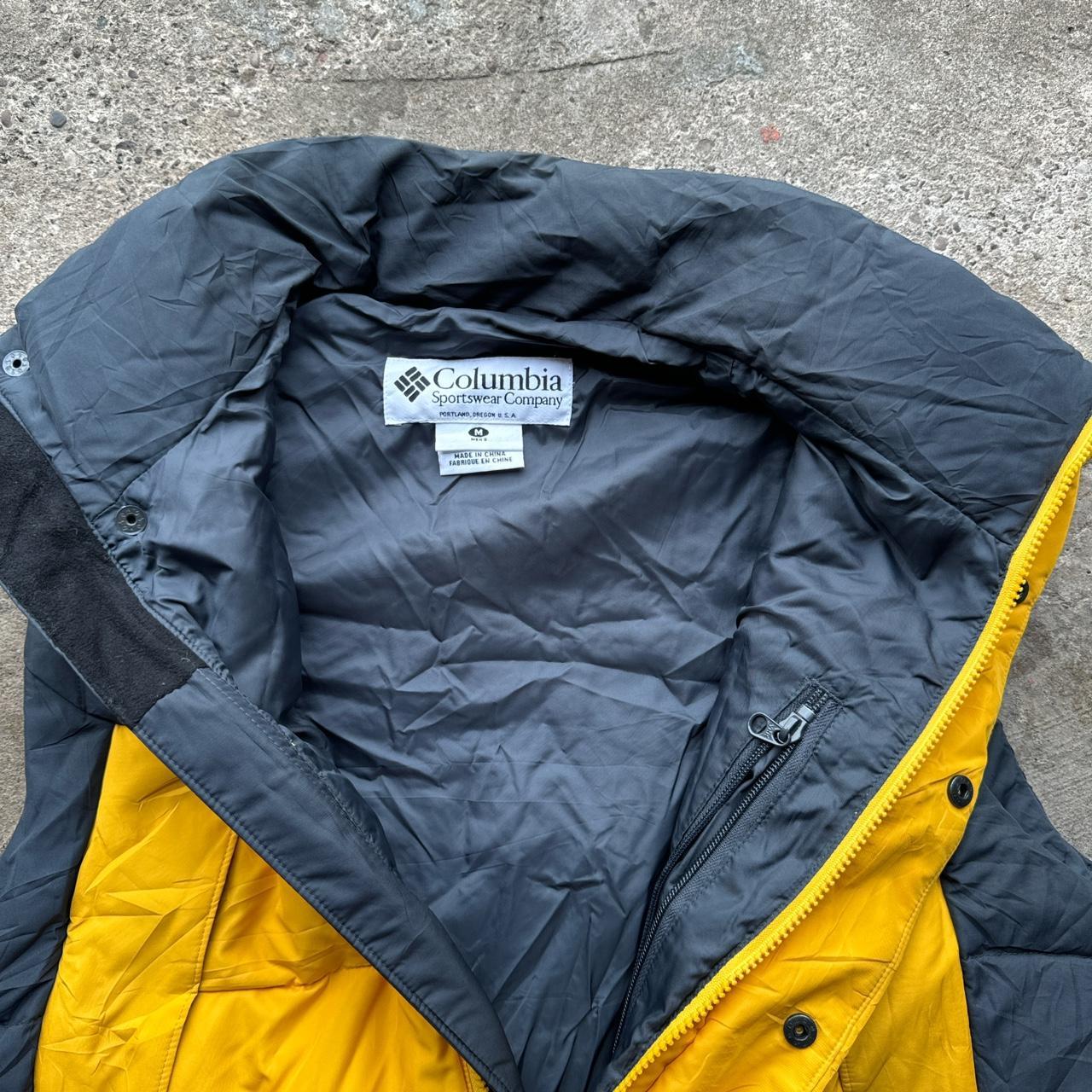 Navy and yellow Columbia puffer gilet