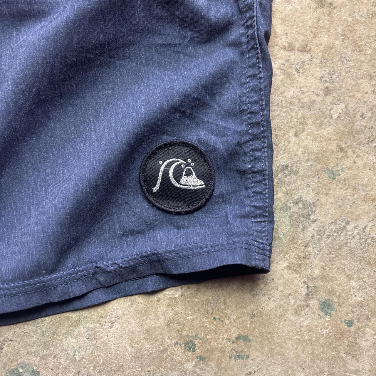 Red and navy Quiksilver board shorts - W32