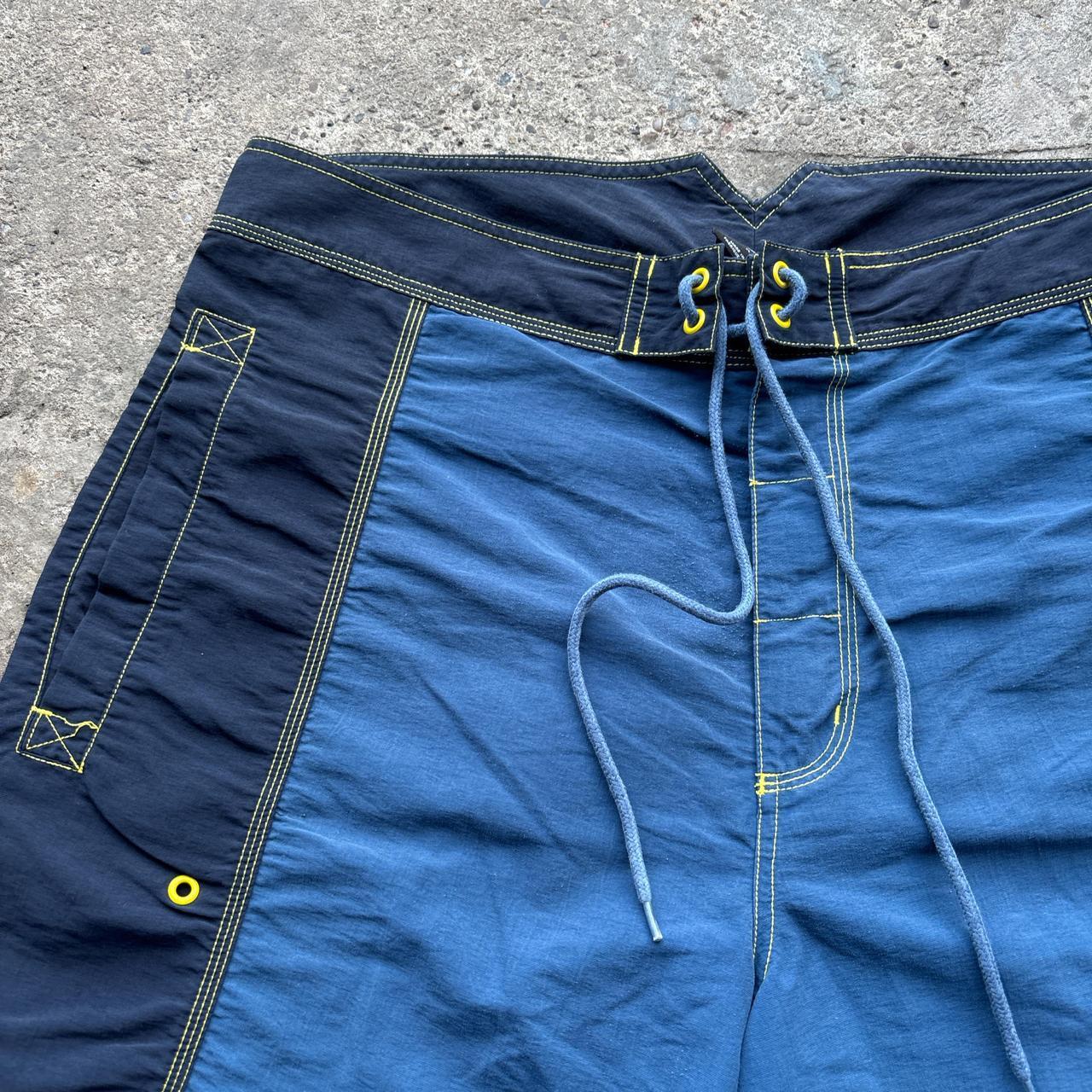 Blue and navy 00s Adidas board shorts