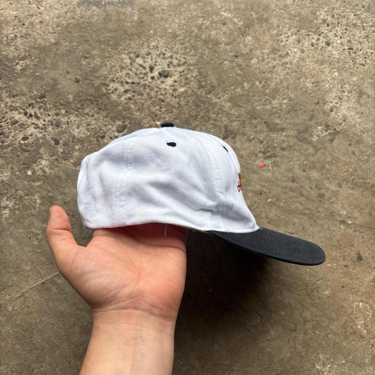 Vintage white cap with ‘Hall Explosives Inc