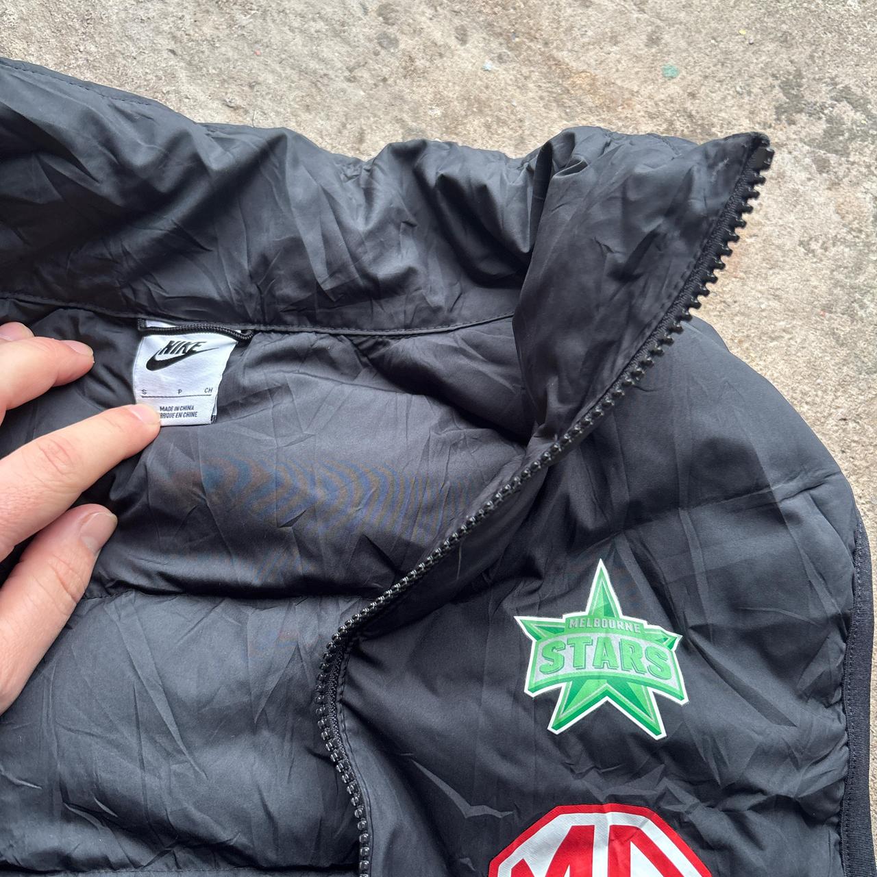 Black Nike puffer gilet with Melbourne Stars logo