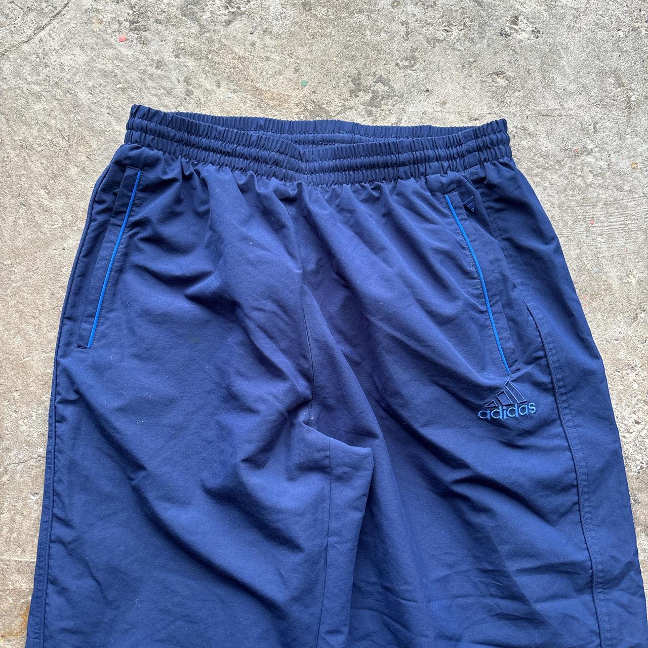 Navy Adidas track pants either blue detailing