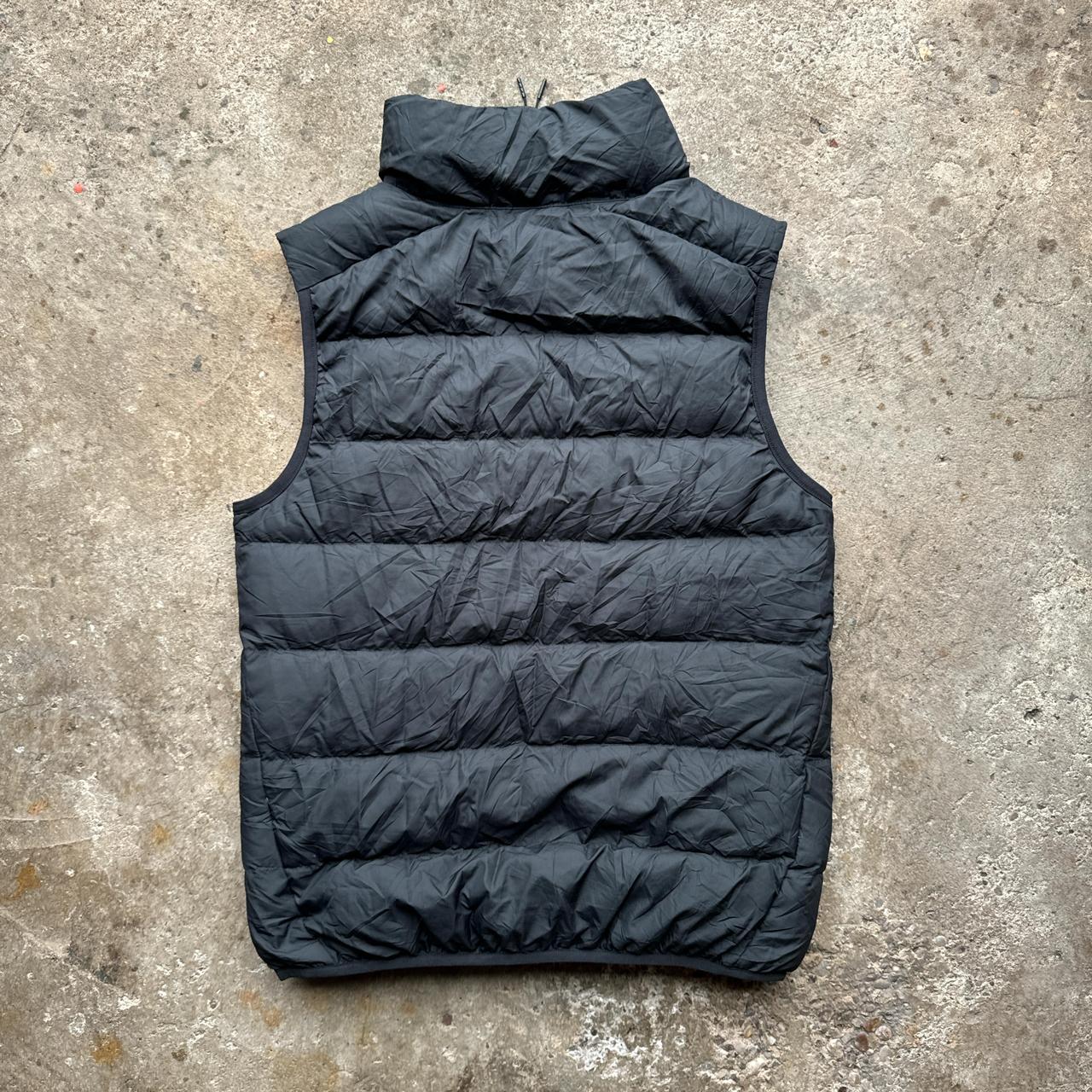 Black Nike puffer gilet with Melbourne Stars logo