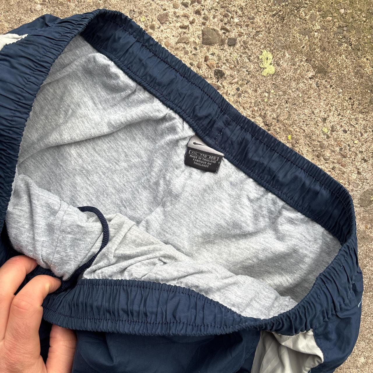00s Navy and grey Nike track pants with embroidered logo