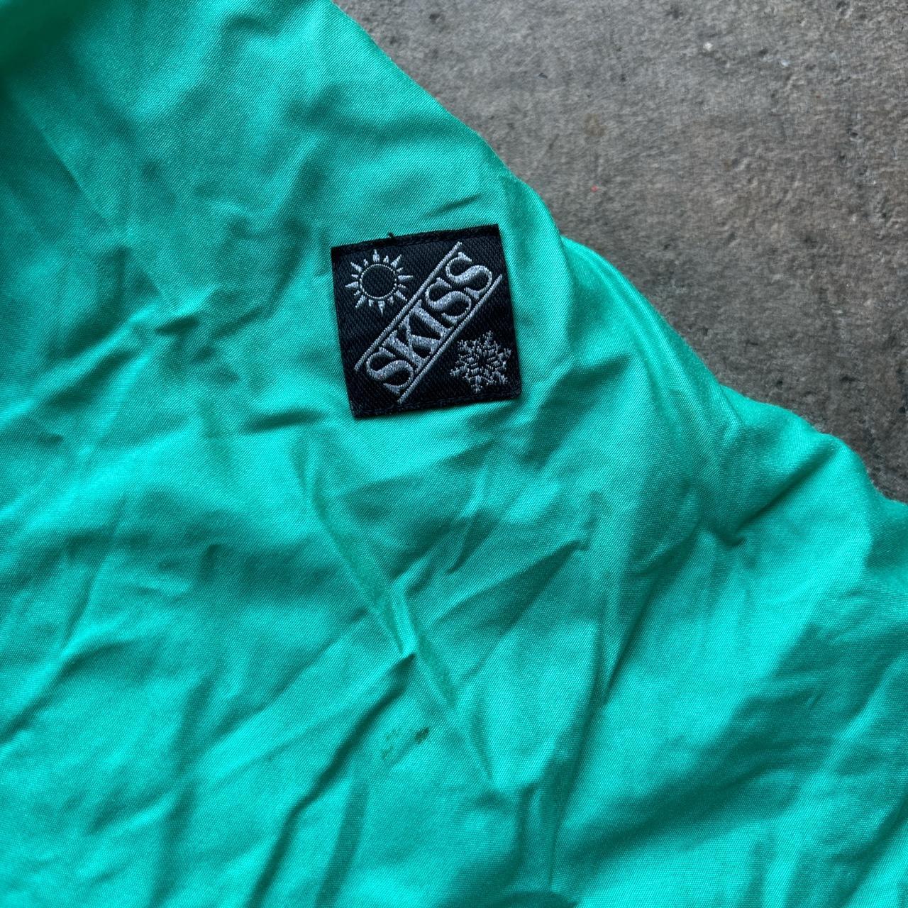 90s vintage Swiss Sport ski suit in blue and green