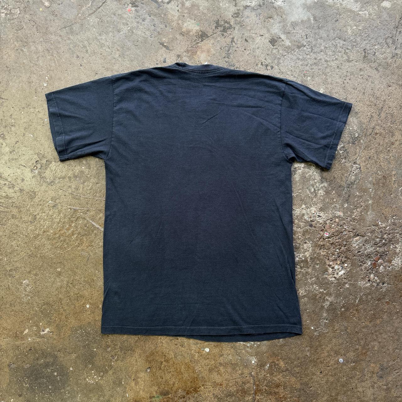 Black graphic tee with skull print