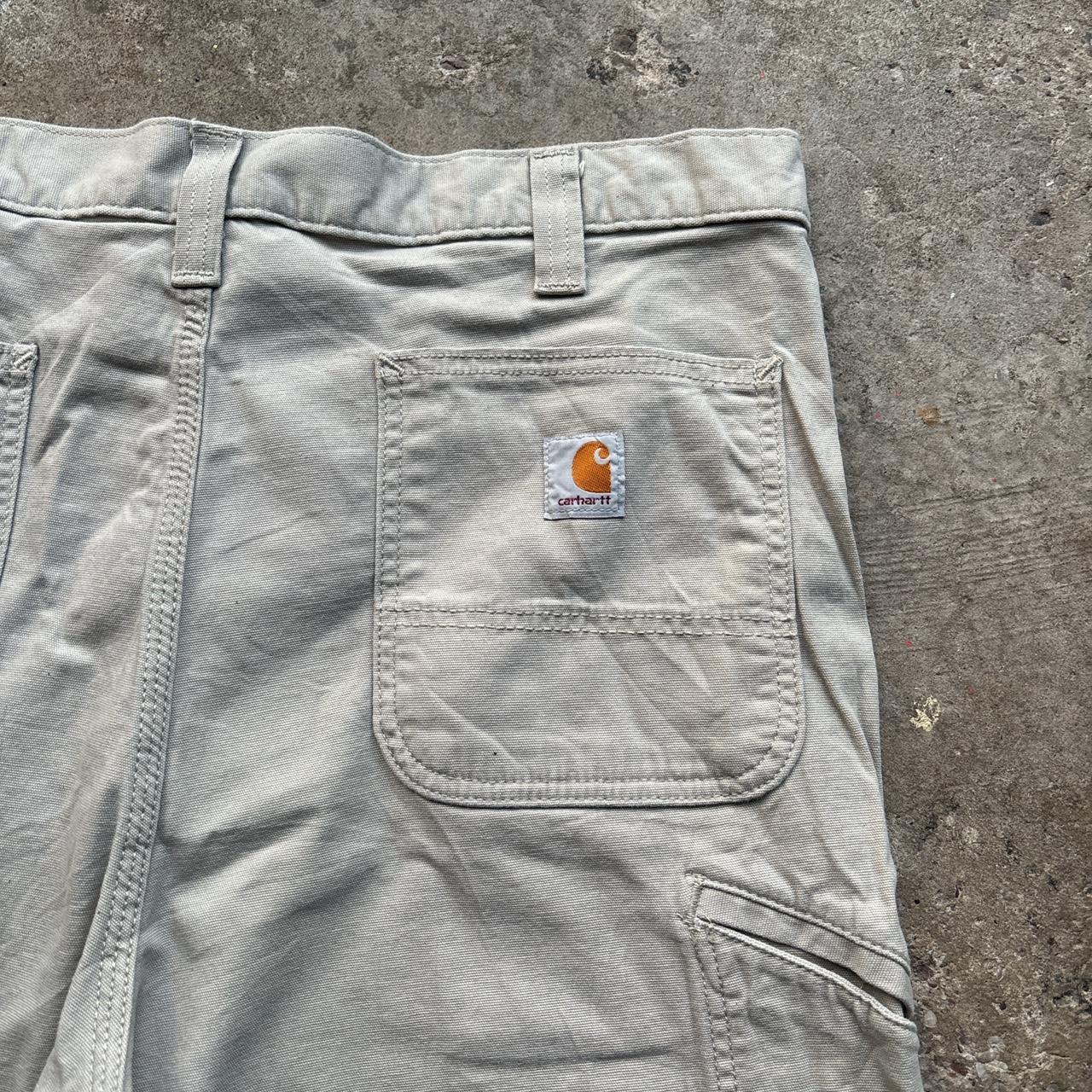 Cream Carhartt shorts
