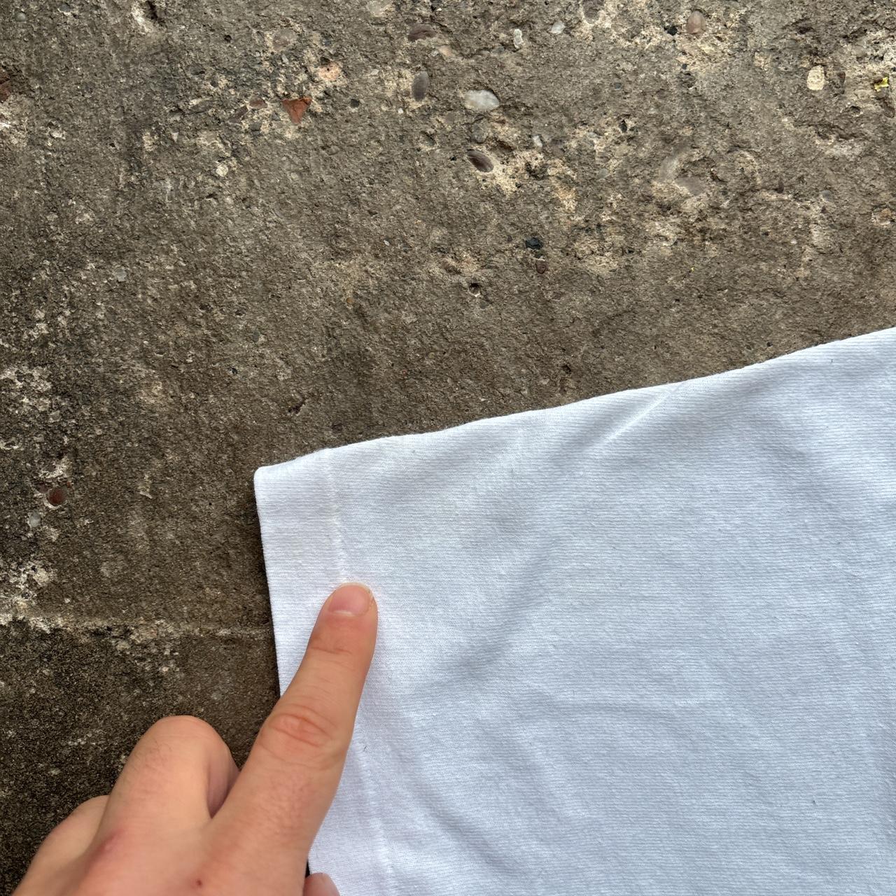 Vintage white graphic tee with Lions print - L