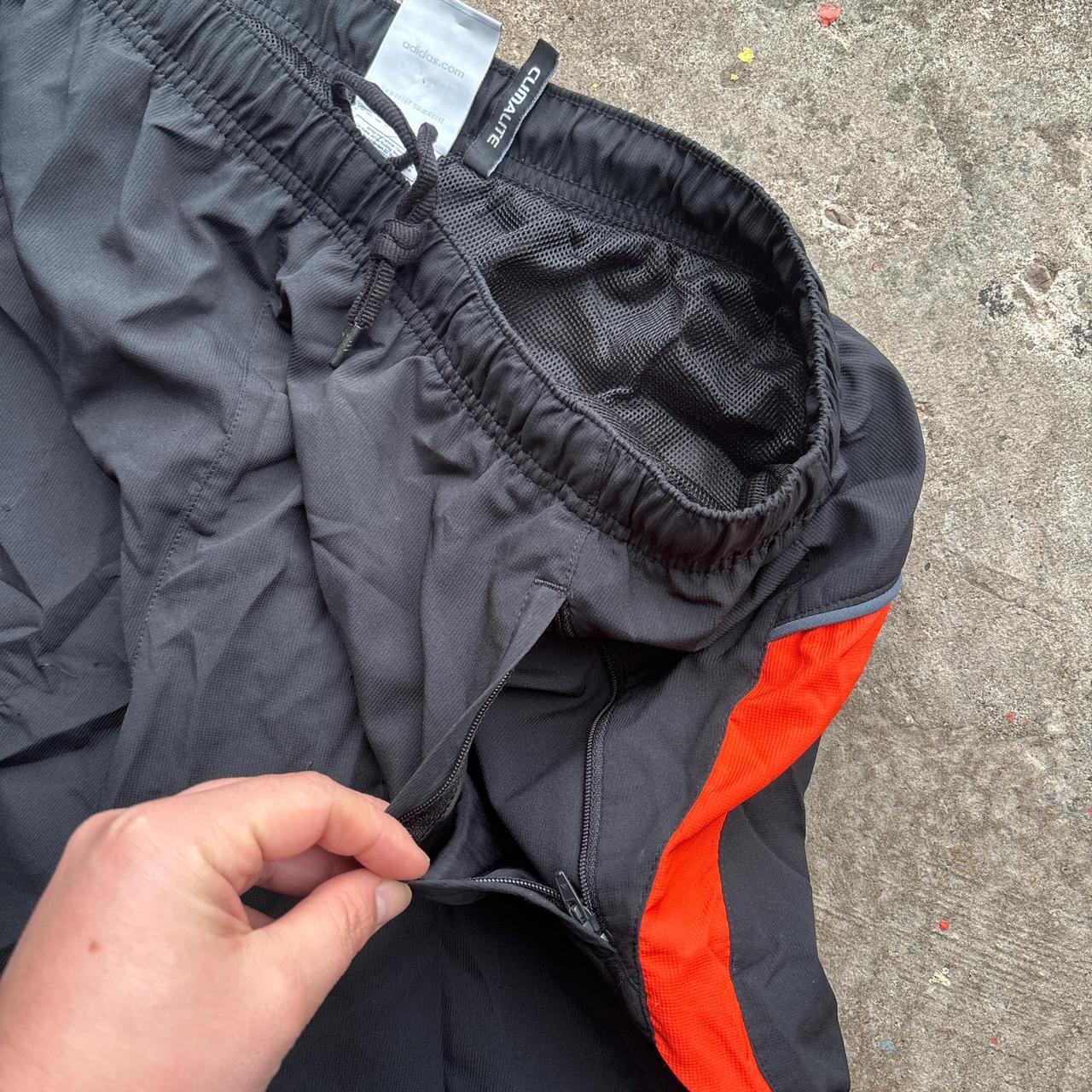 00s Black and orange Adidas track pants
