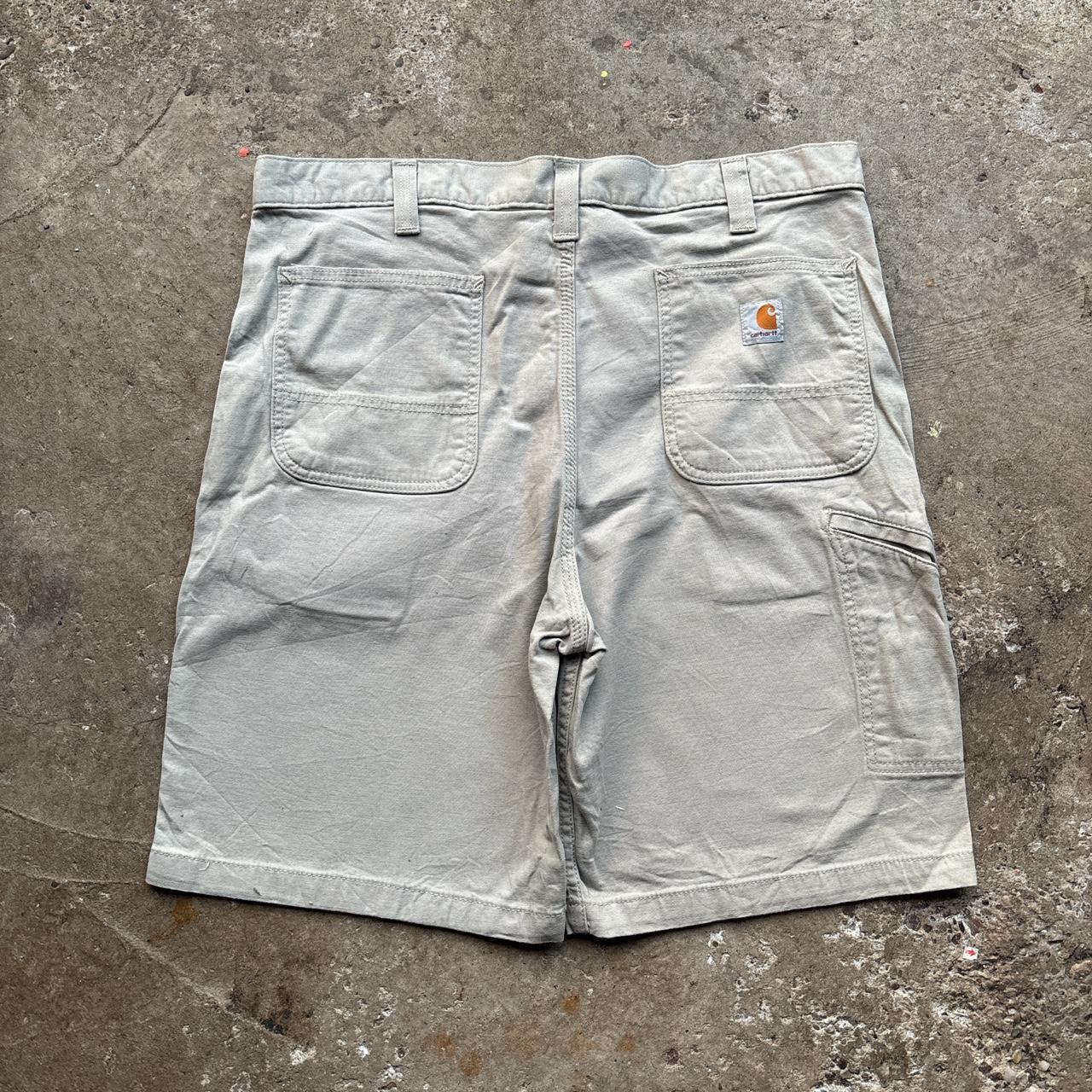 Cream Carhartt shorts