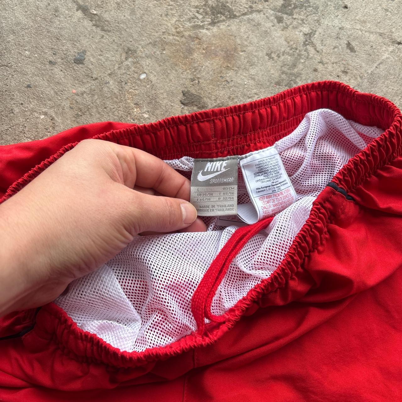 00s red Nike swim shorts / trunks
