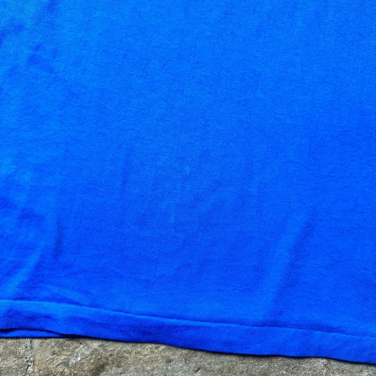 00s Blue graphic tee with ‘Muddy Trail Fun Run’ graphic at the back