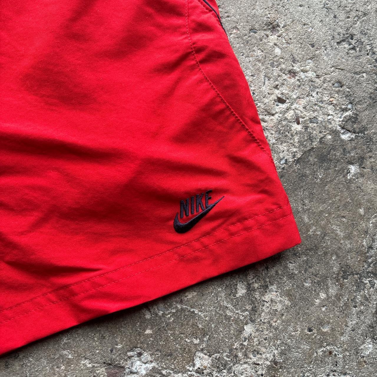 00s red Nike swim shorts / trunks