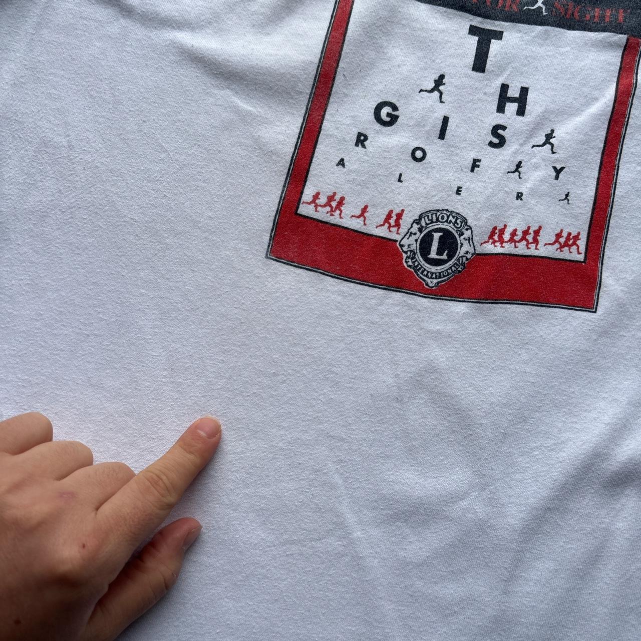 Vintage white graphic tee with Lions print - L