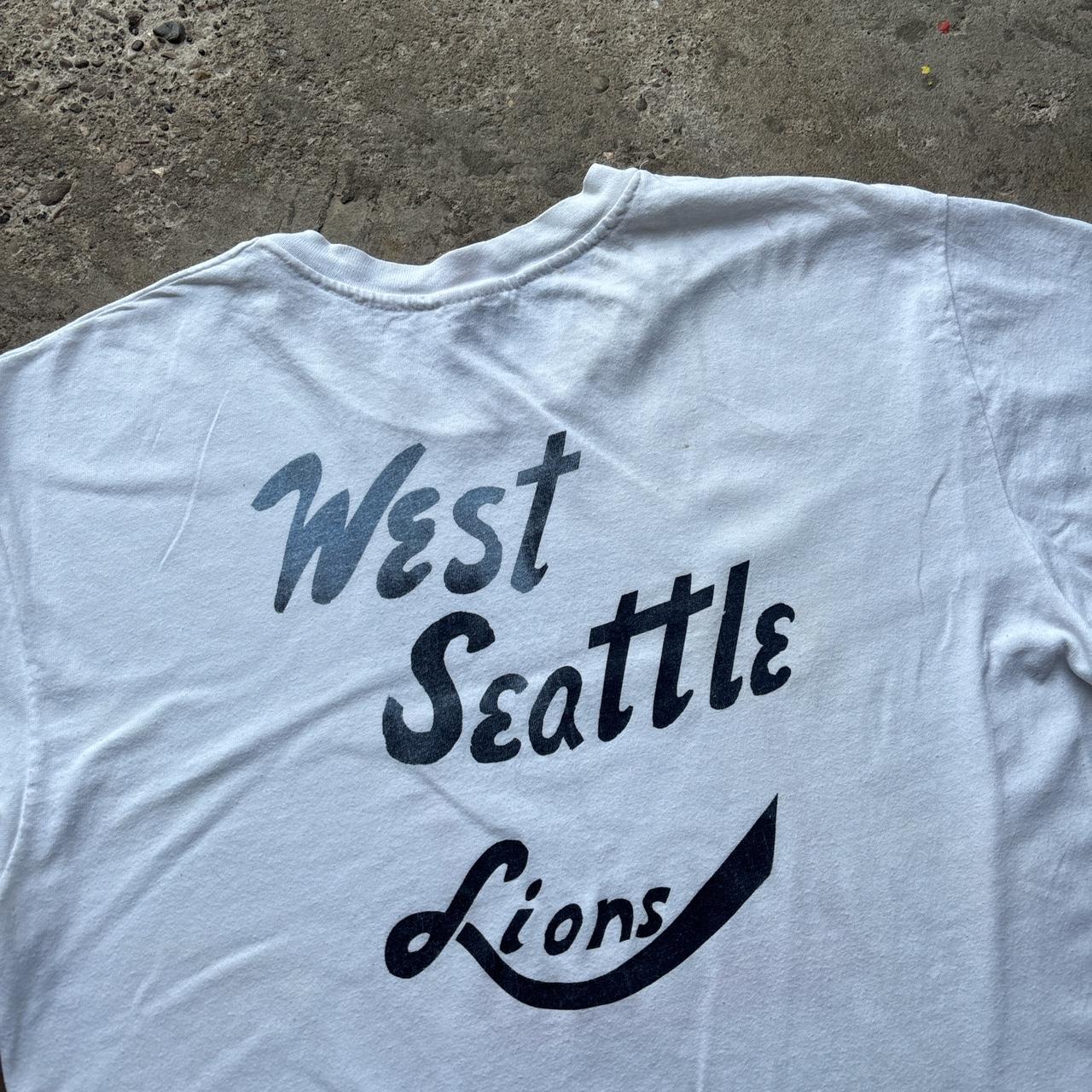 Vintage white graphic tee with Lions print - L