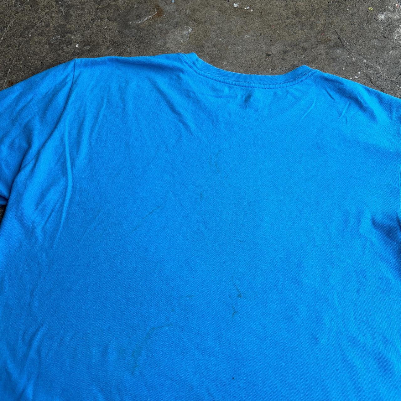 Blue Nike Air tee with silver logo