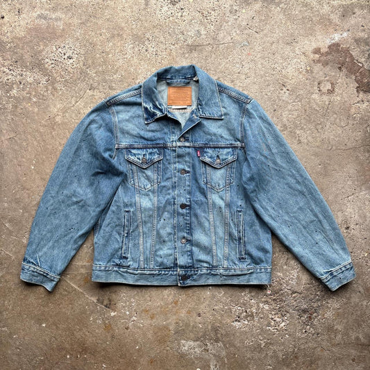 Blue Levi’s Trucker jacket with paint splats