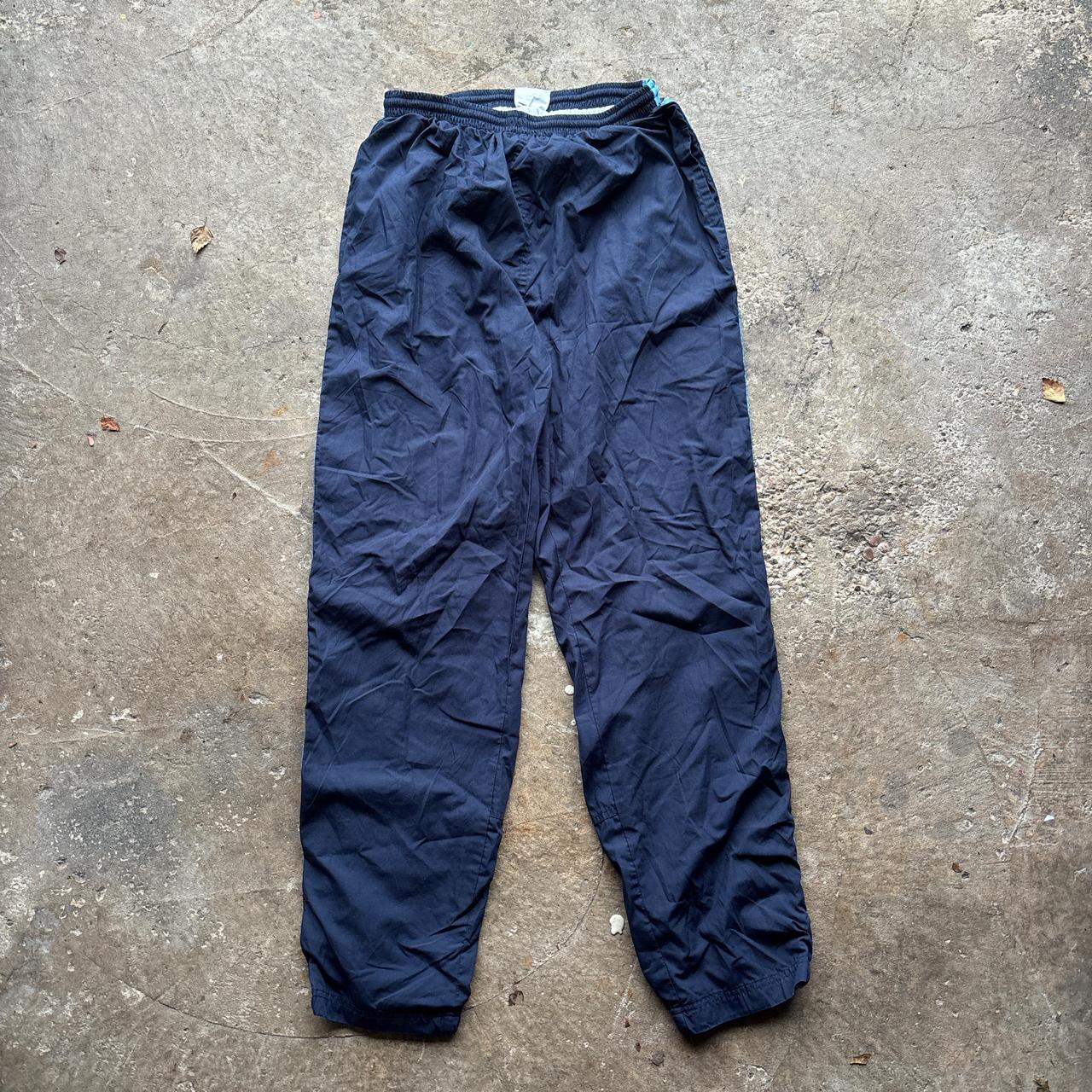 Navy vintage Le Coq Sporting track pants with elastic waistband and side pockets