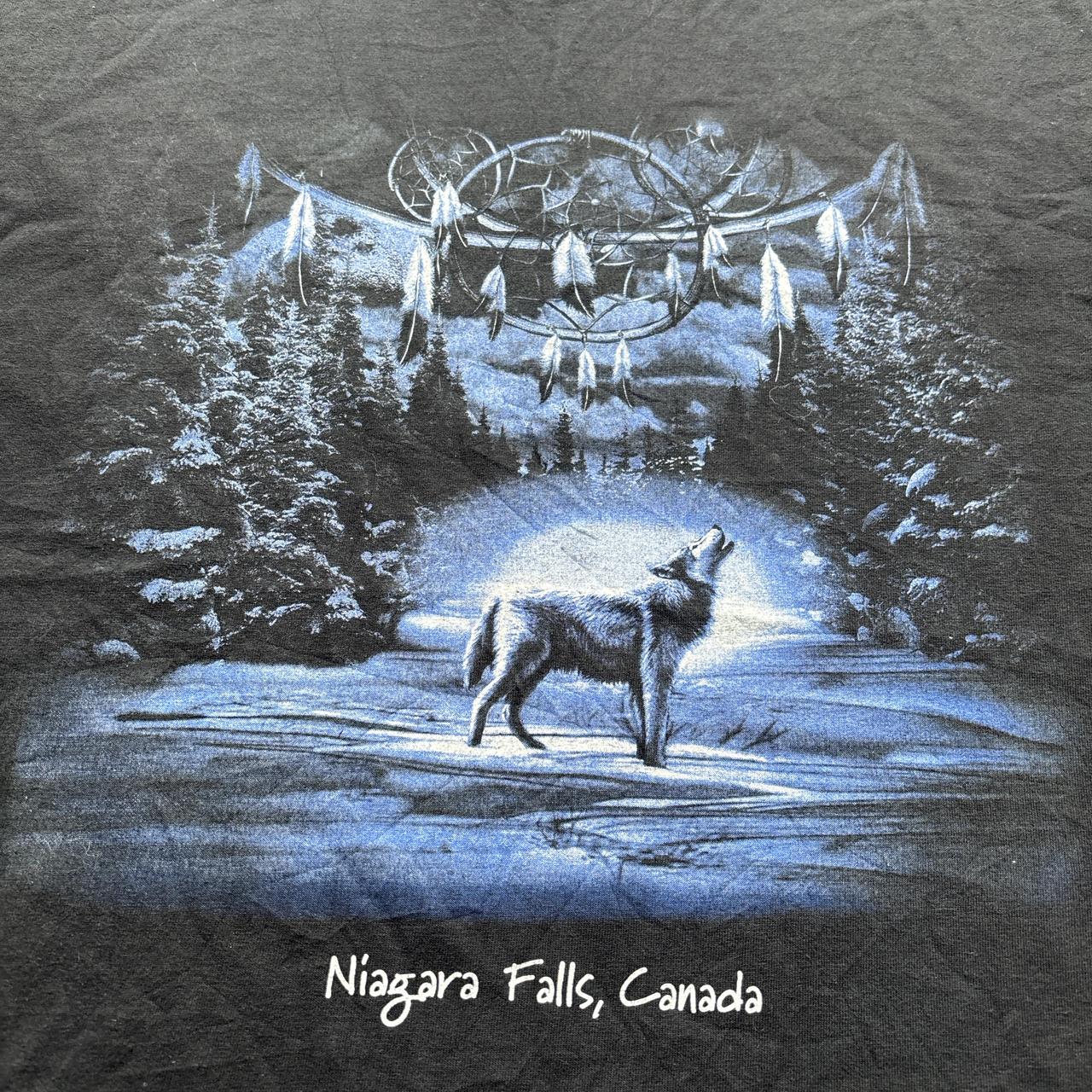 Black graphic tee with Niagara Falls, Canada wolf print