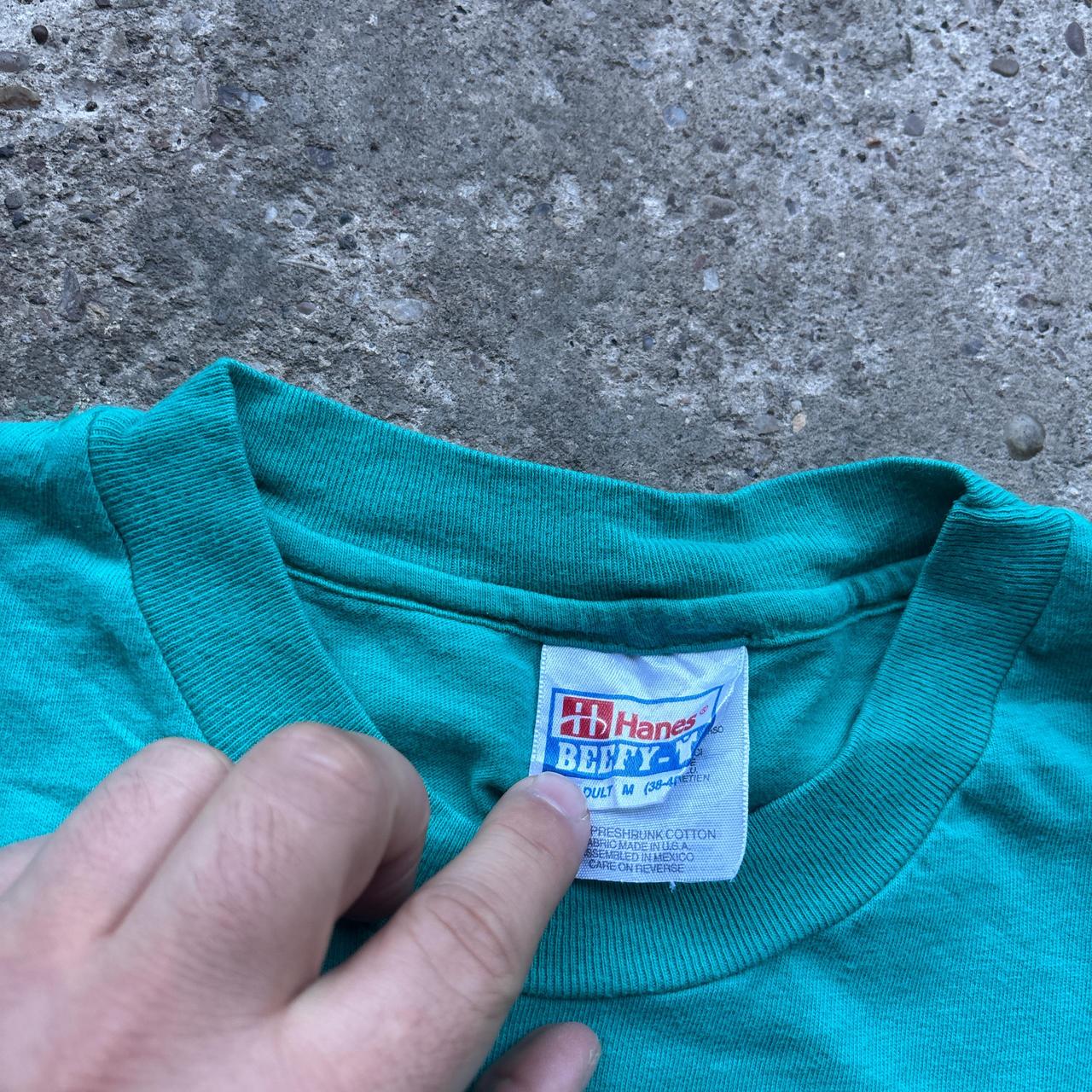 Turquoise single stitch t-shirt with ‘Girls Scouts’ print