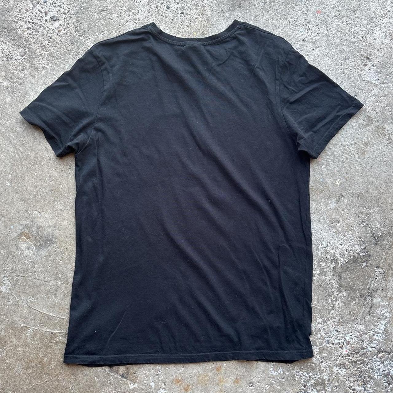 Black Iron Maiden graphic tee with custom holes