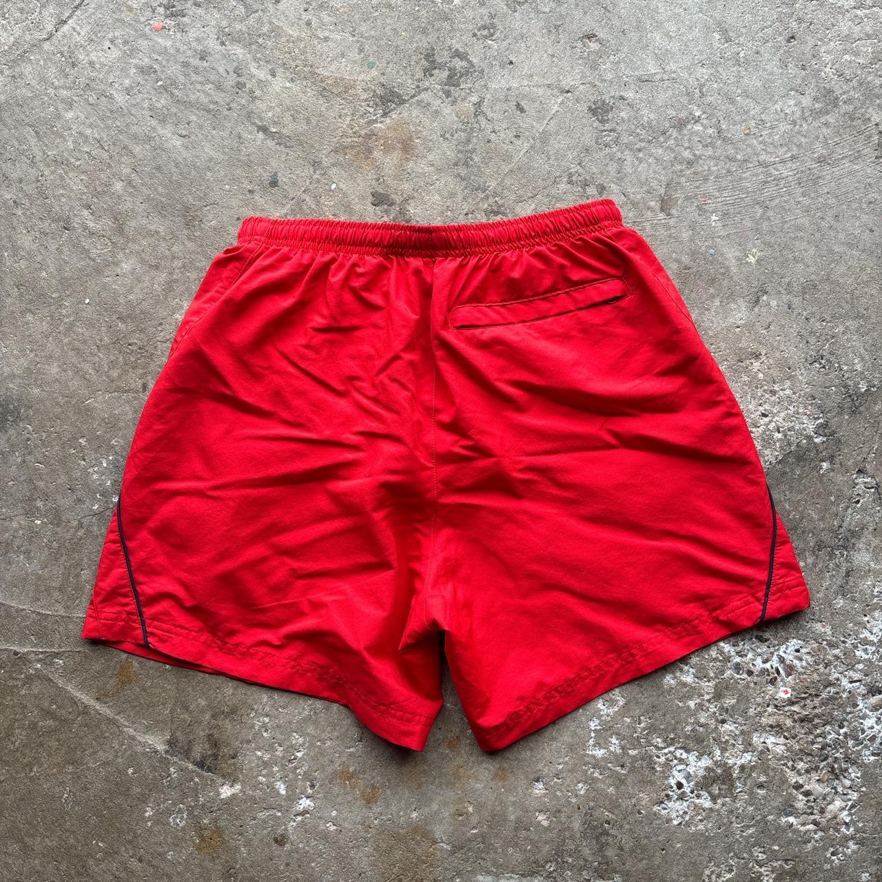 00s red Nike swim shorts / trunks