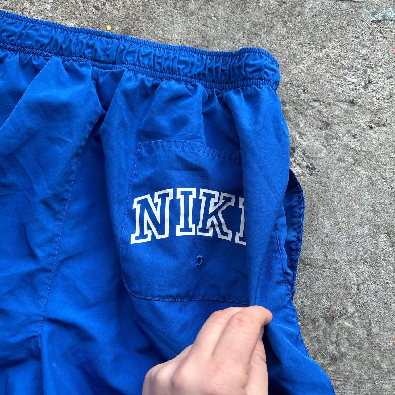 Blue Nike swim shorts / trunks