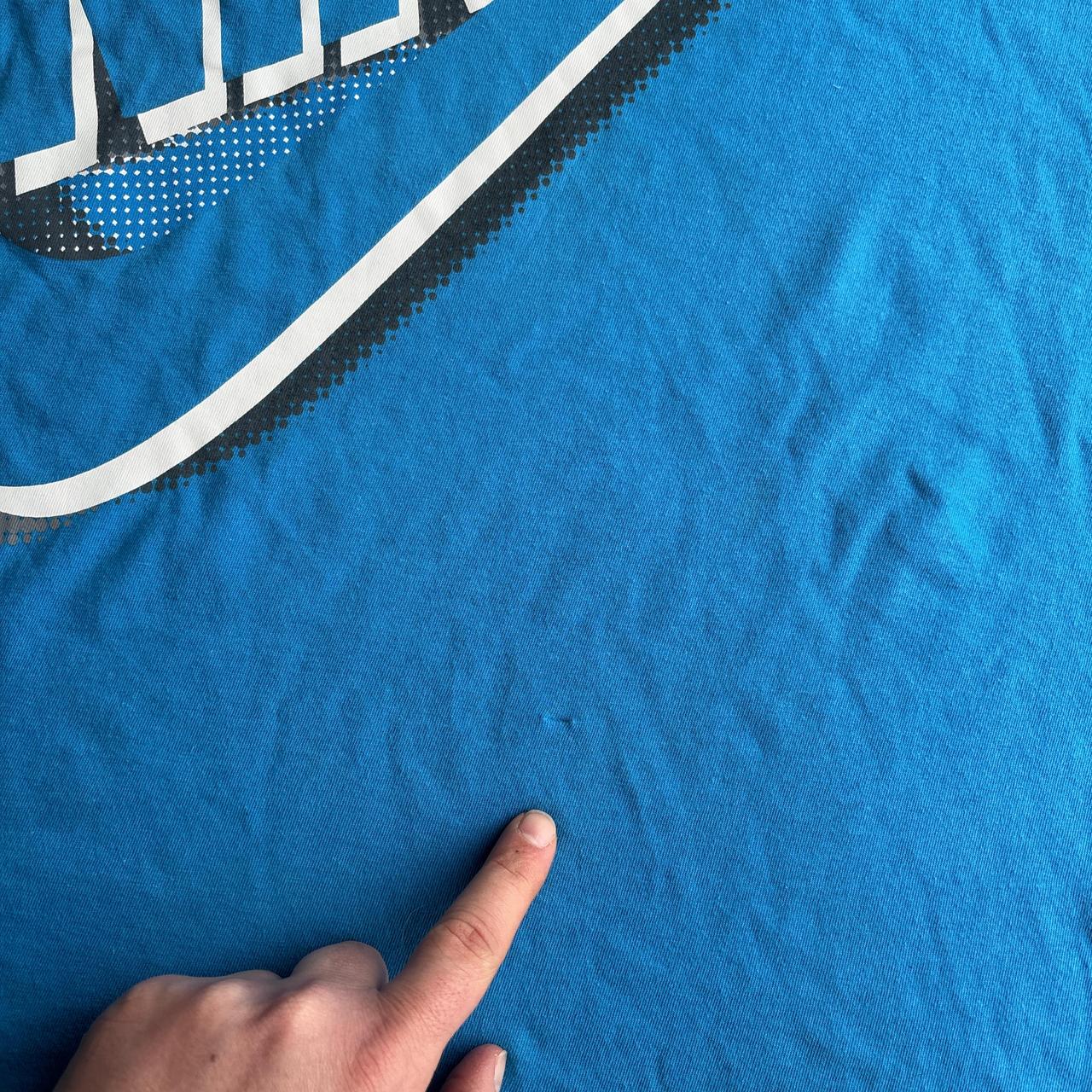Blue Nike Air tee with silver logo