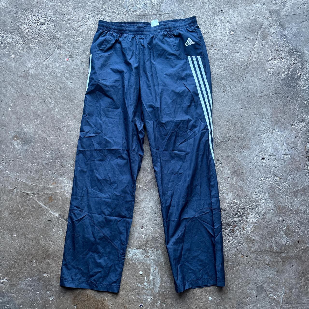Navy blue Adidas track pants