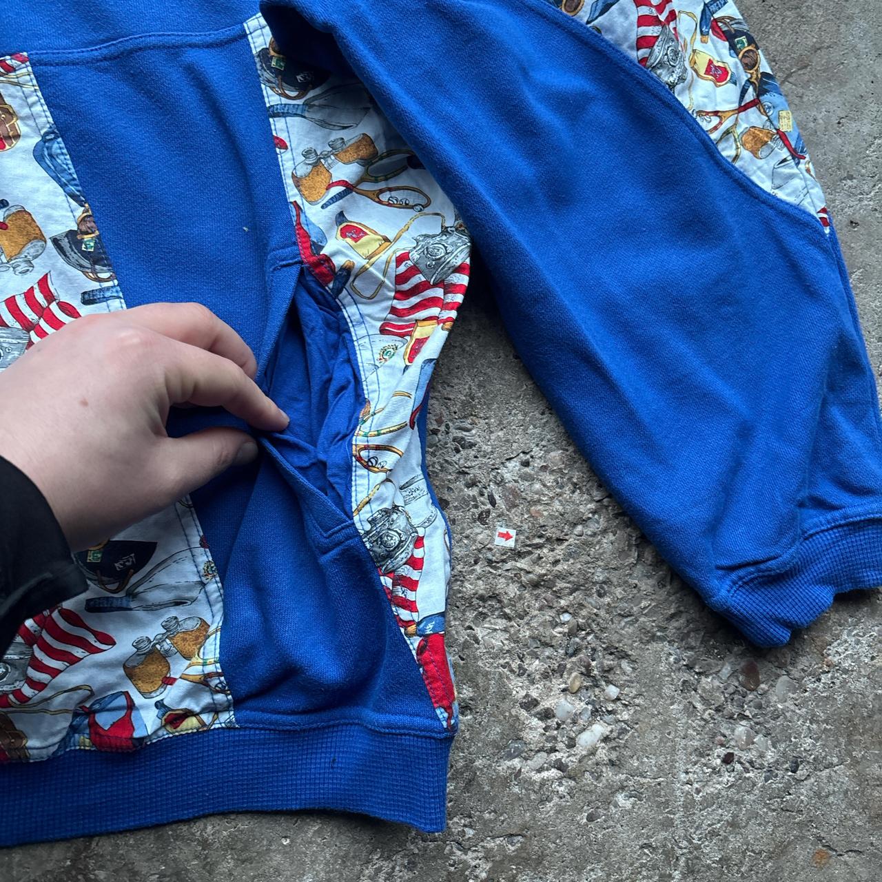 Blue and patterned half-zip sweatshirt