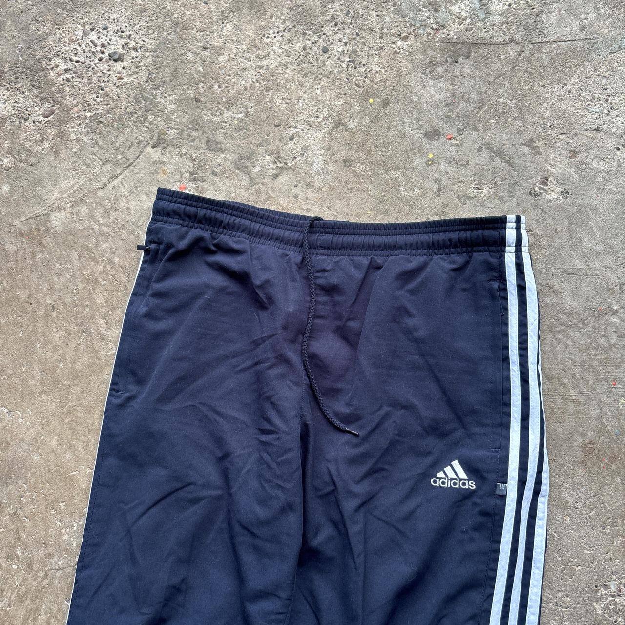 00s Navy Adidas track pants with drawstring waist adidas