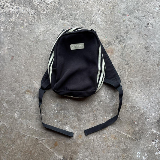 Black Adidas bag with wrap around cream stripes