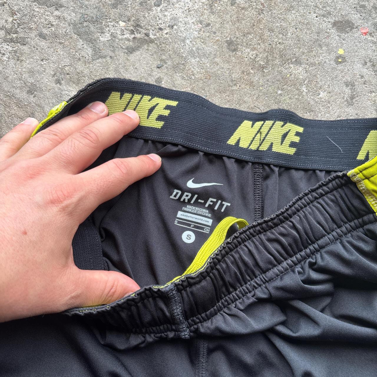 Black and yellow Nike basketball shorts - S