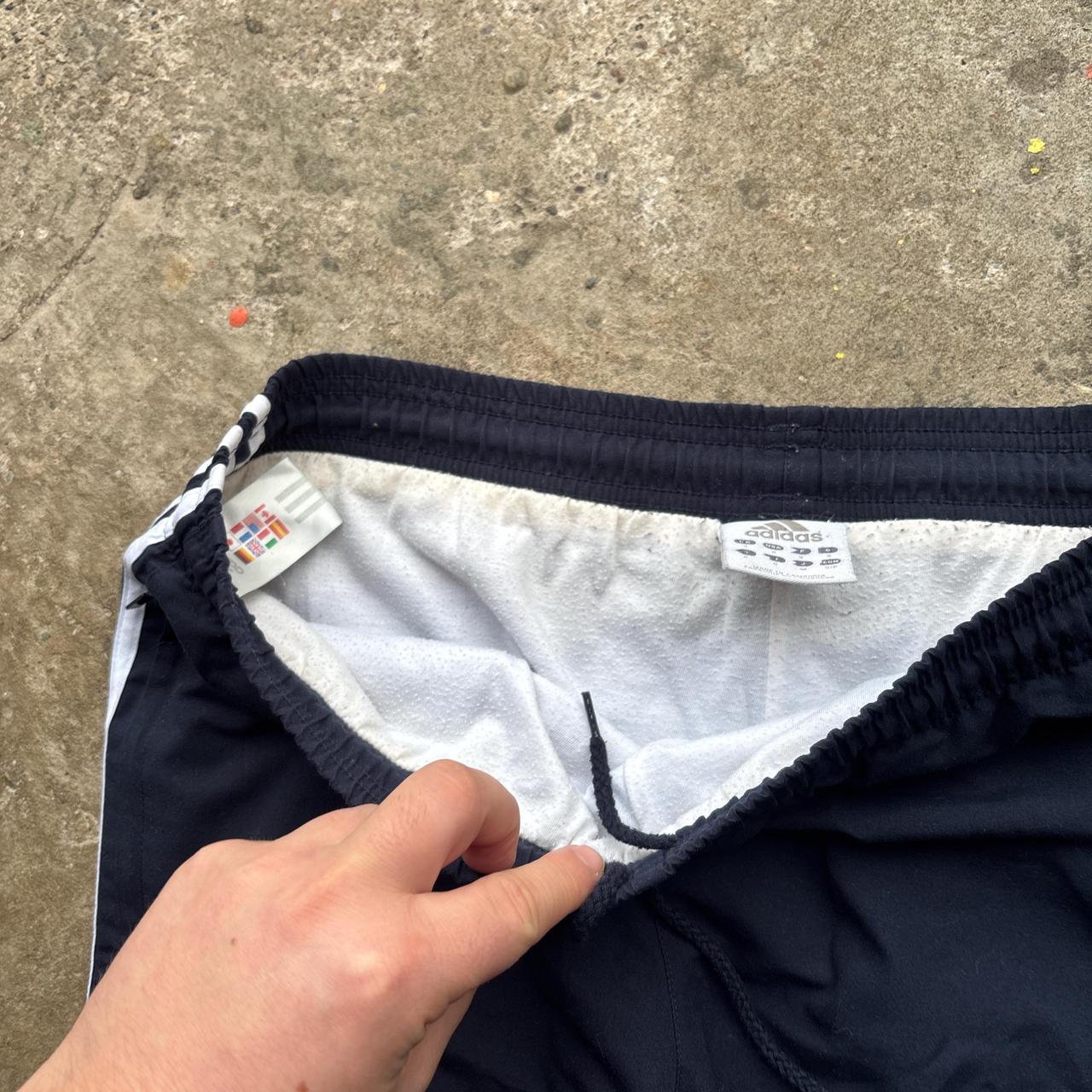 00s Navy Adidas track pants with drawstring waist adidas