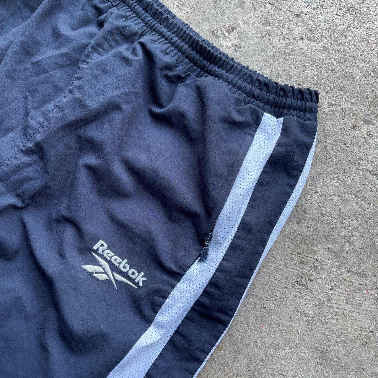 Vintage Navy Reebok tracksuit bottoms with embroidered logo