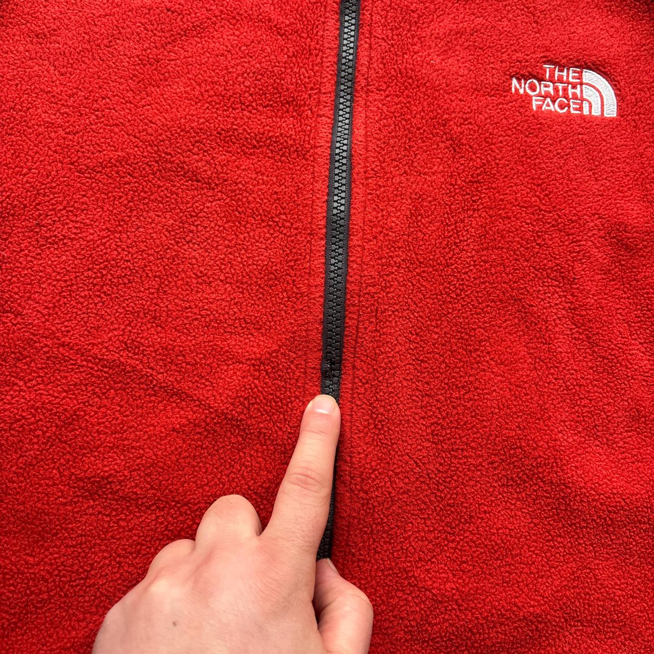 Red and grey The North Face zip-up fleece