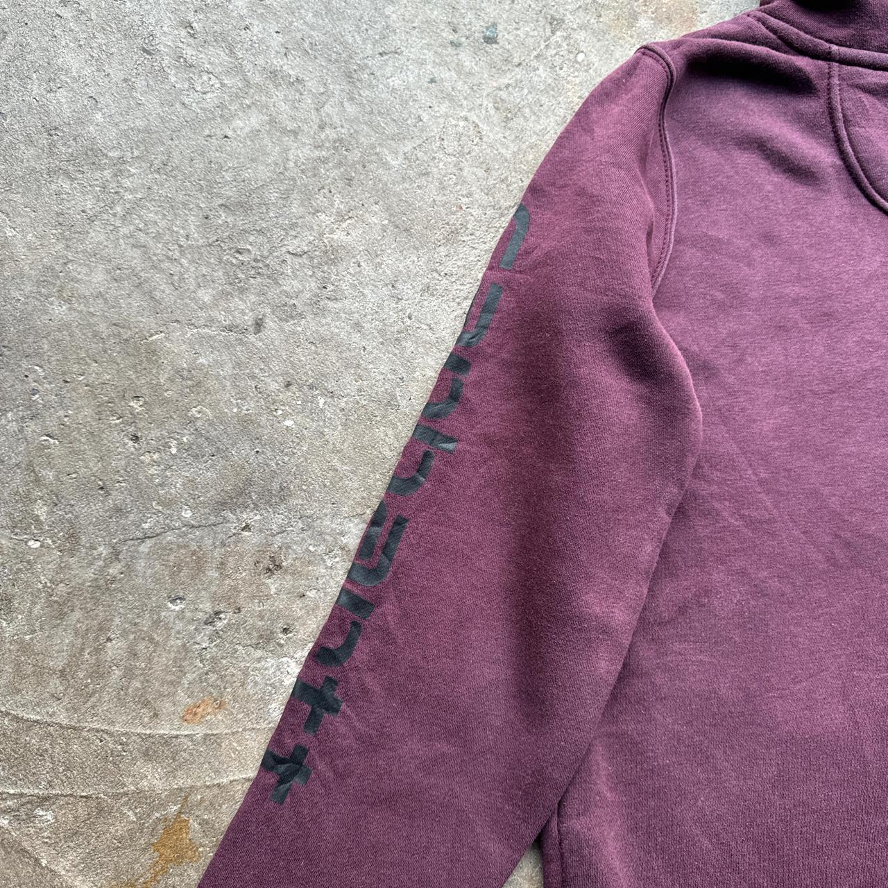 Burgundy Carhartt hoody with black print down the sleeve