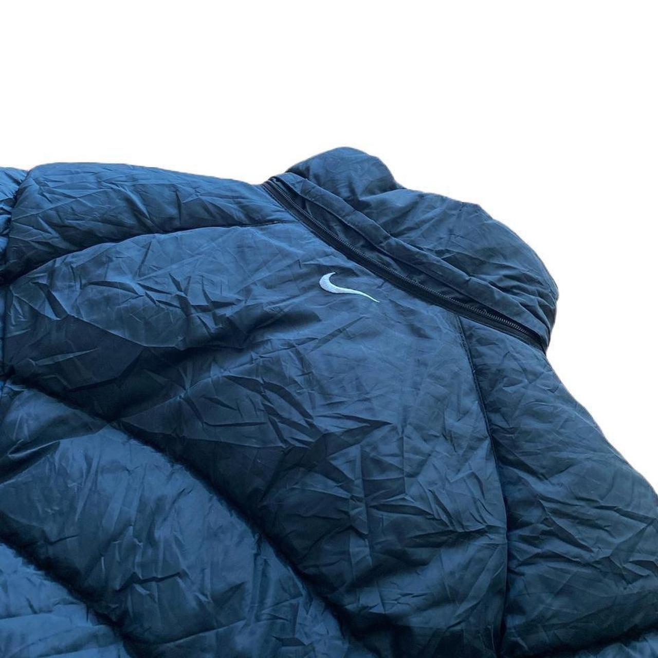 Women’s 00s black Nike puffer jacket with white embroidered logos