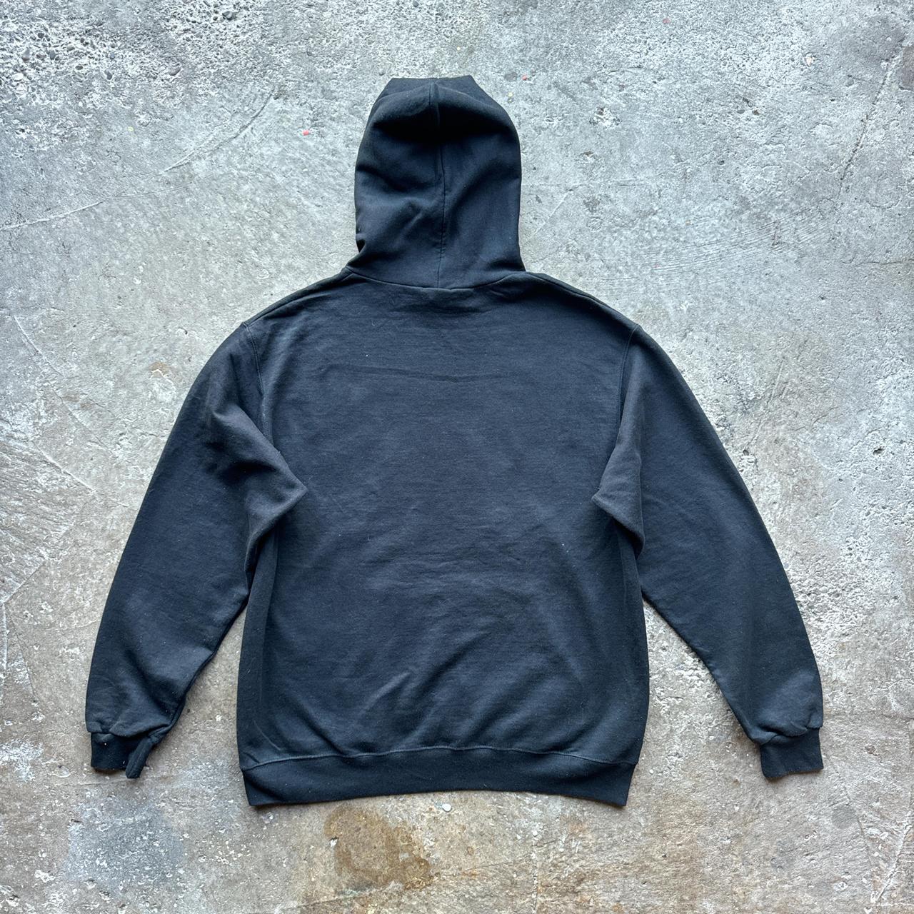 Black Champion hood with ‘NIU, Huskies’ print