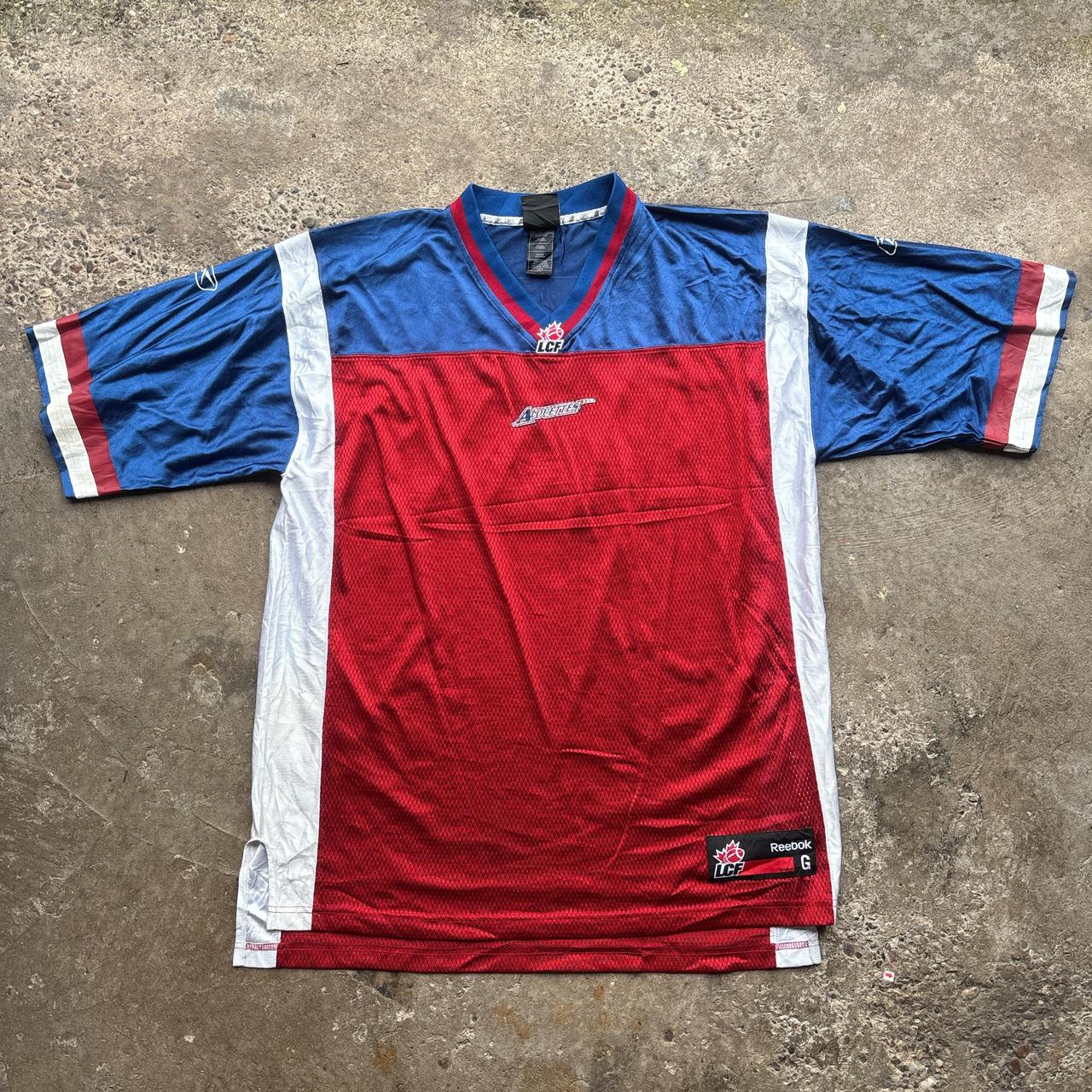Red, blue and white Reebok CFL Alouettes jersey