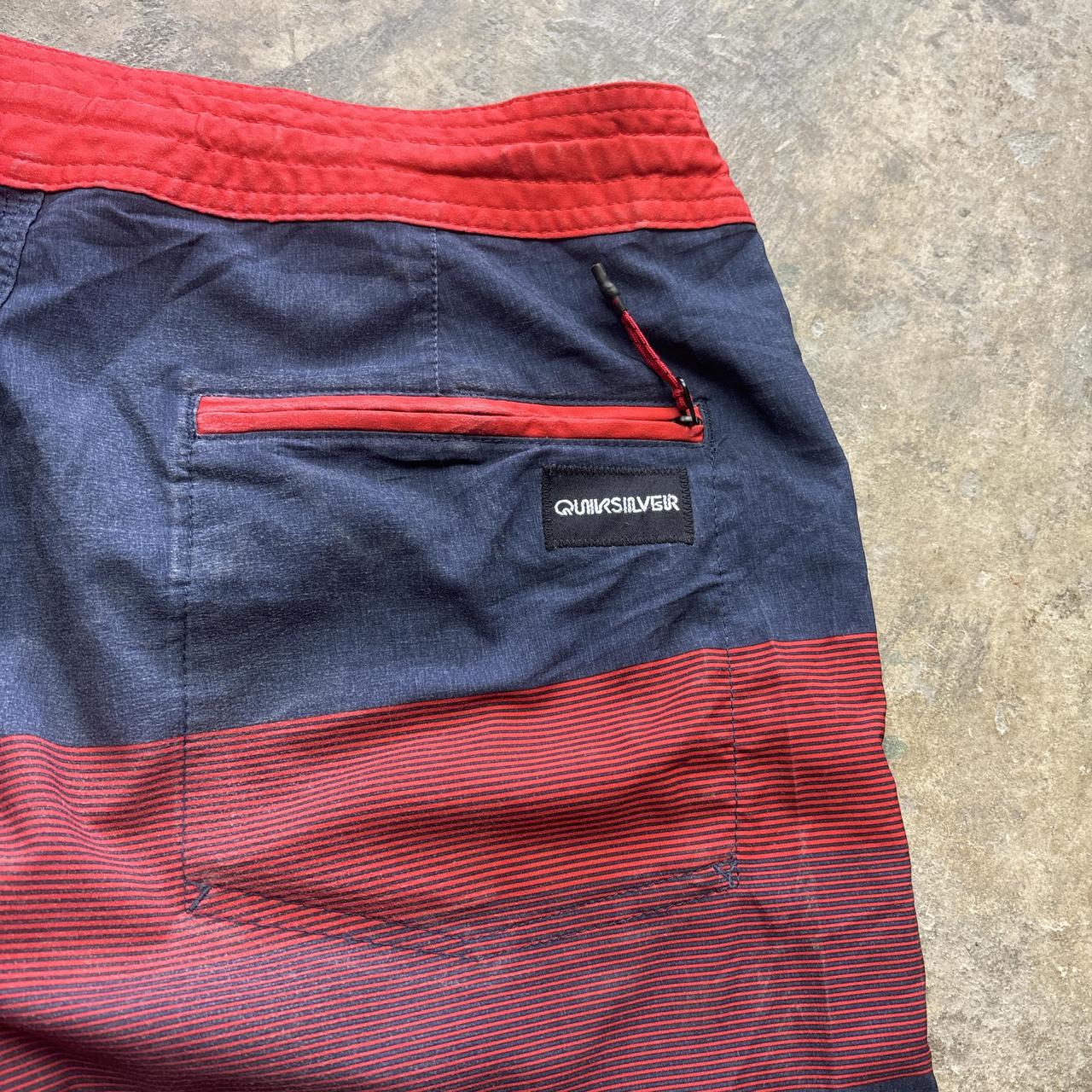 Red and navy Quiksilver board shorts - W32
