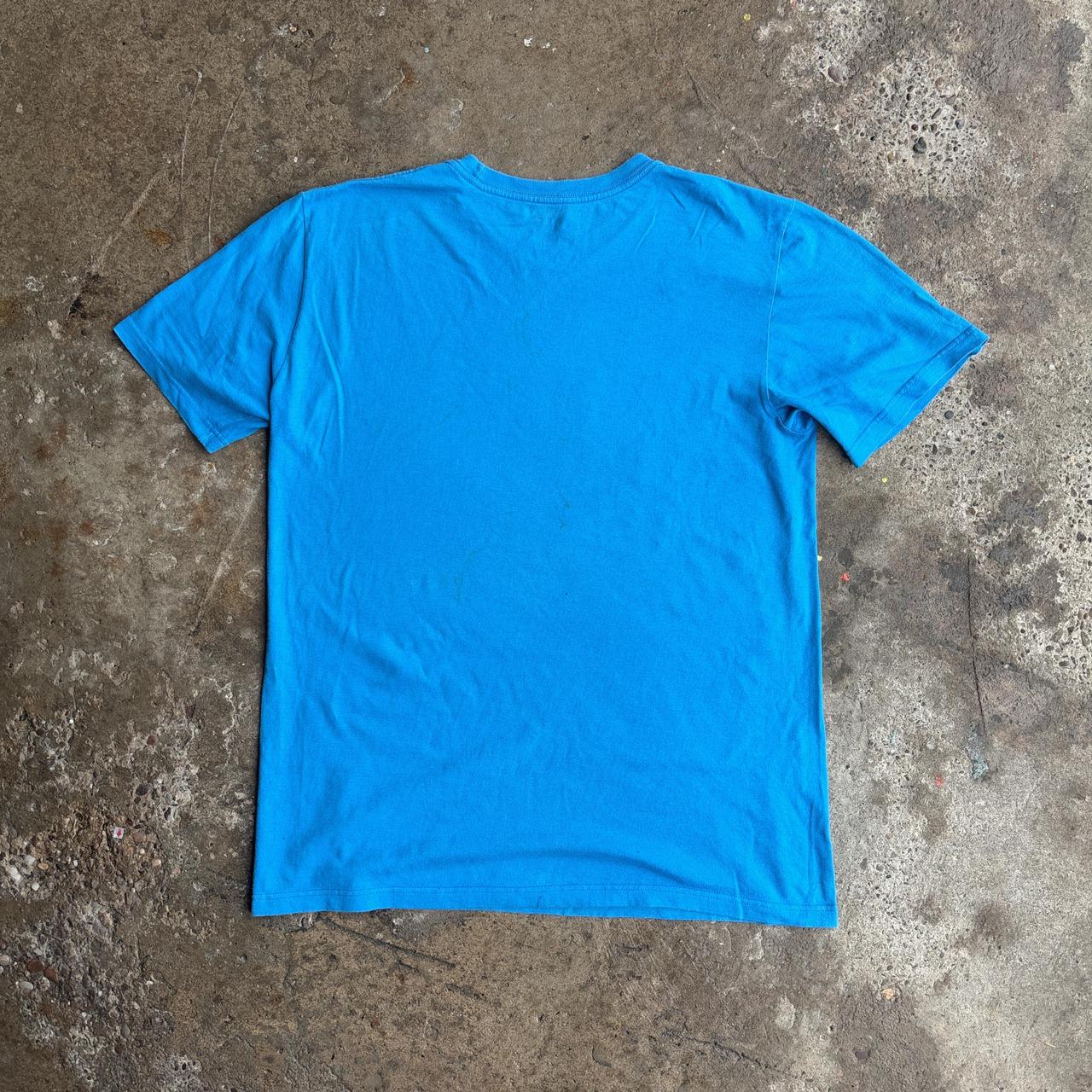 Blue Nike Air tee with silver logo