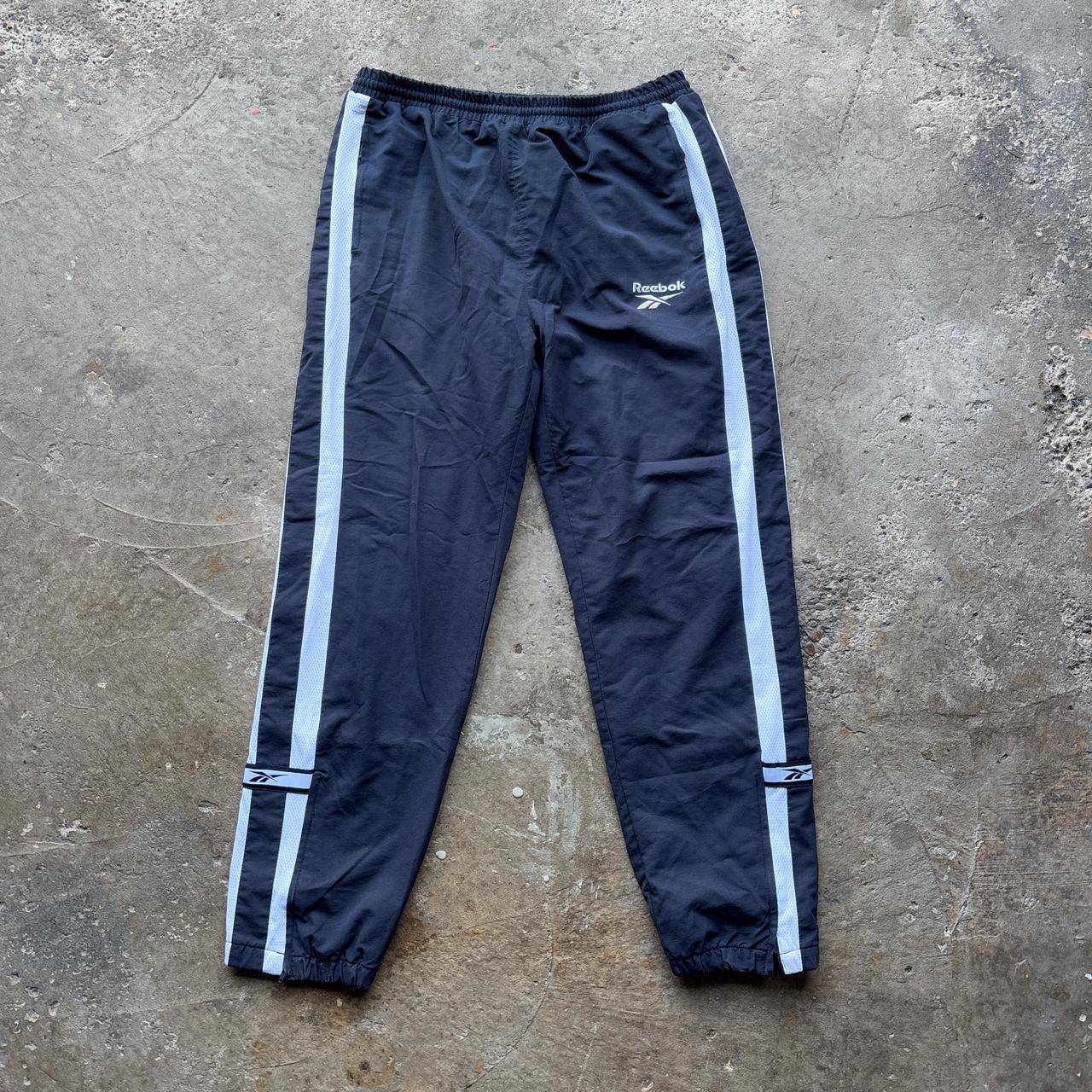 Vintage Navy Reebok tracksuit bottoms with embroidered logo
