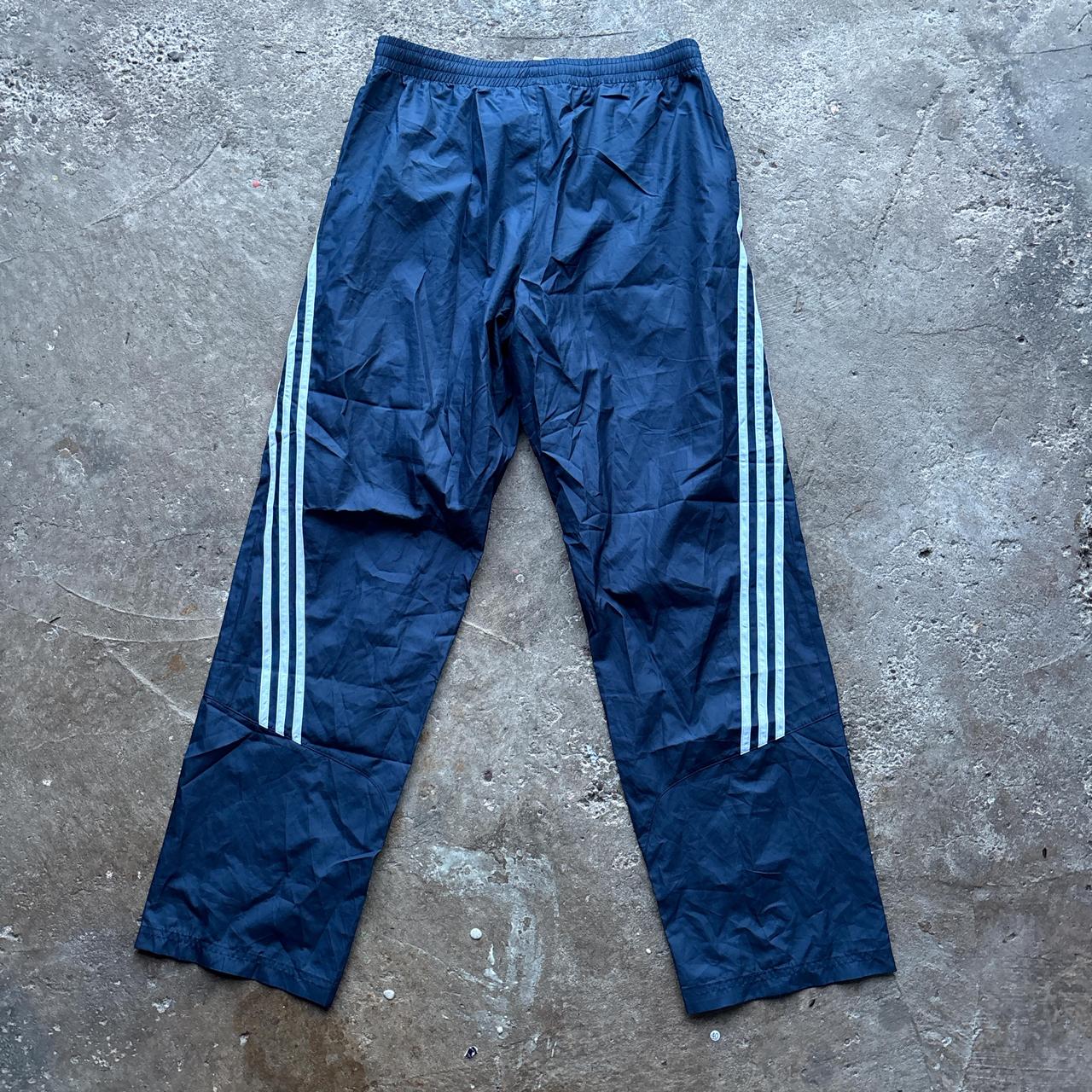 Navy blue Adidas track pants