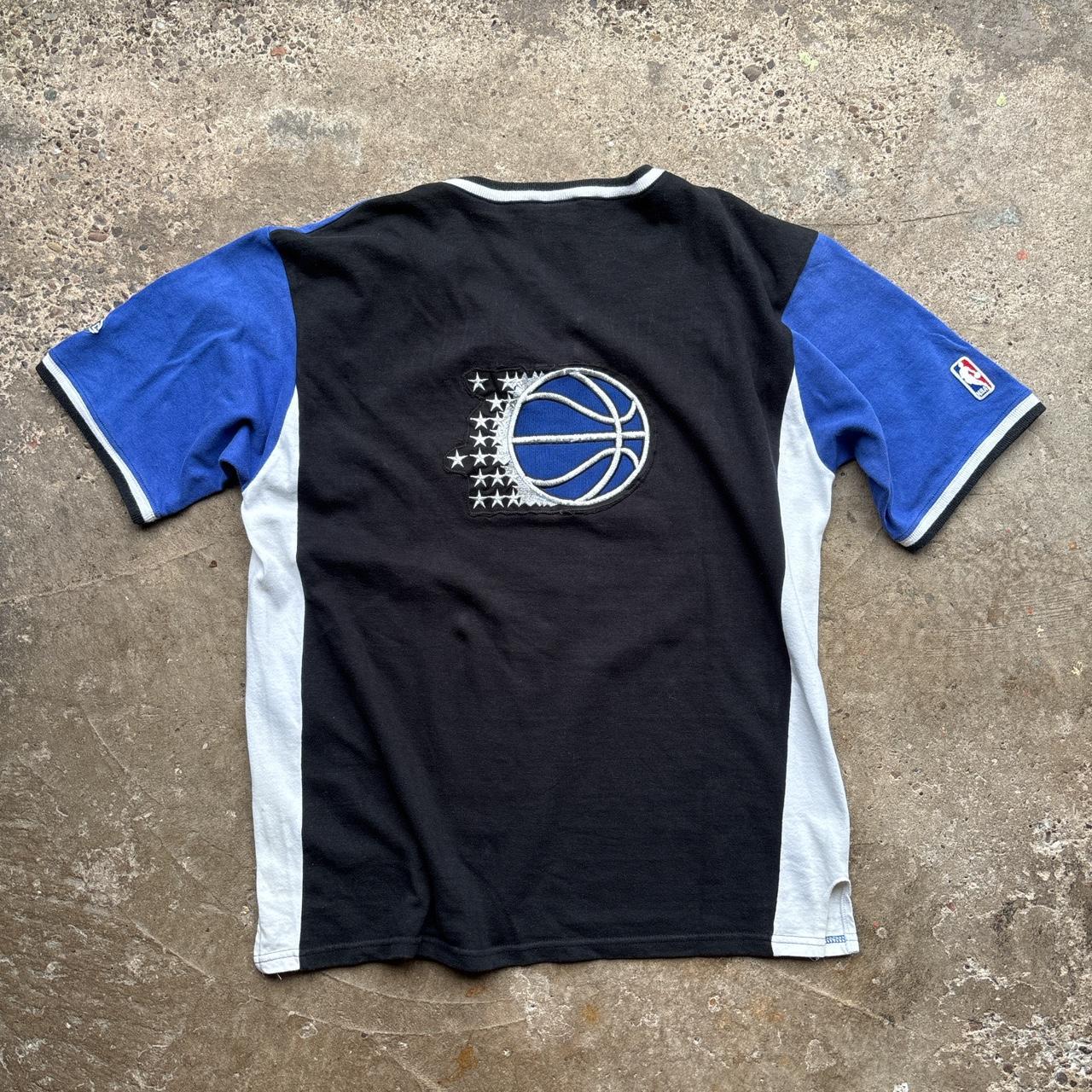 Vintage Orlando Magic 1995-97 Champion Shooting Shirt Jersey in blue, white and