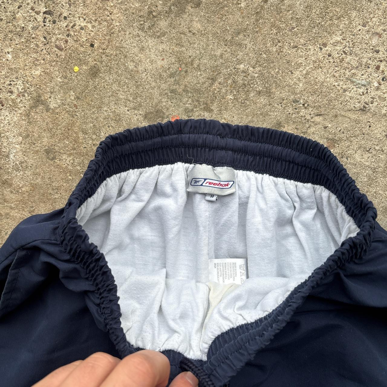 Vintage Navy Reebok track pants with white stripes