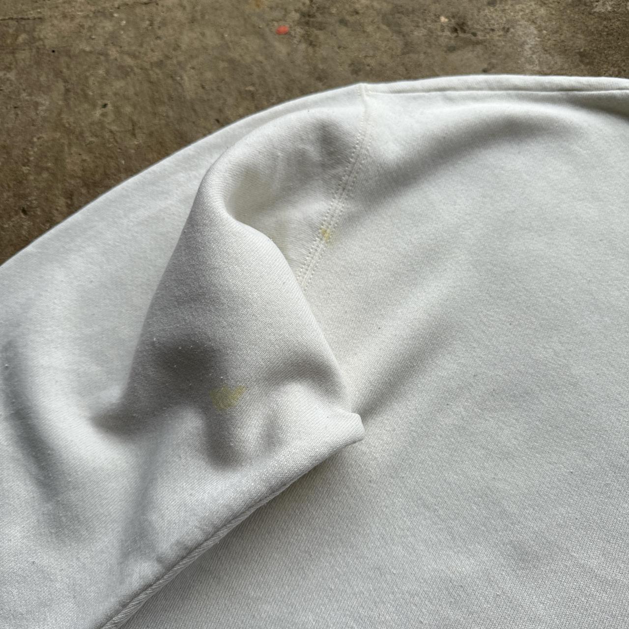 White 90s sweatshirt with ‘Antique’ print